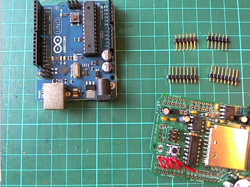 The Arduino Uno and Wave Shield components.